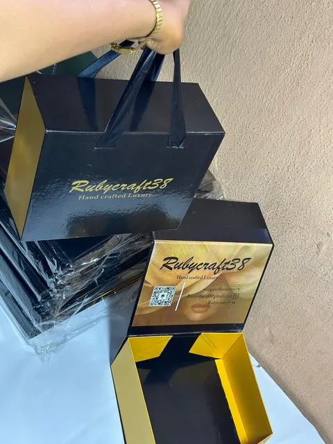 Rubycraft38 rigid gift boxes with ribbon handles and gold-foil branding