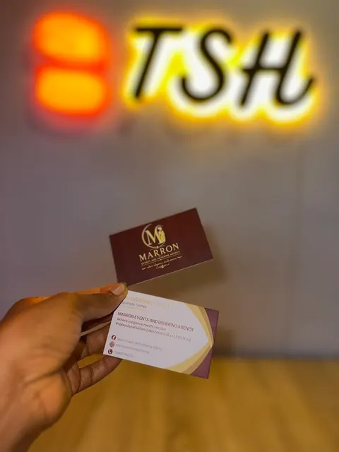 Marron Events maroon and gold foil business cards